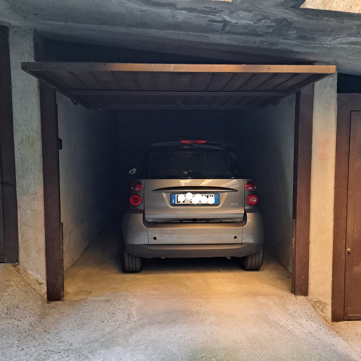 Private garage with the roller door open