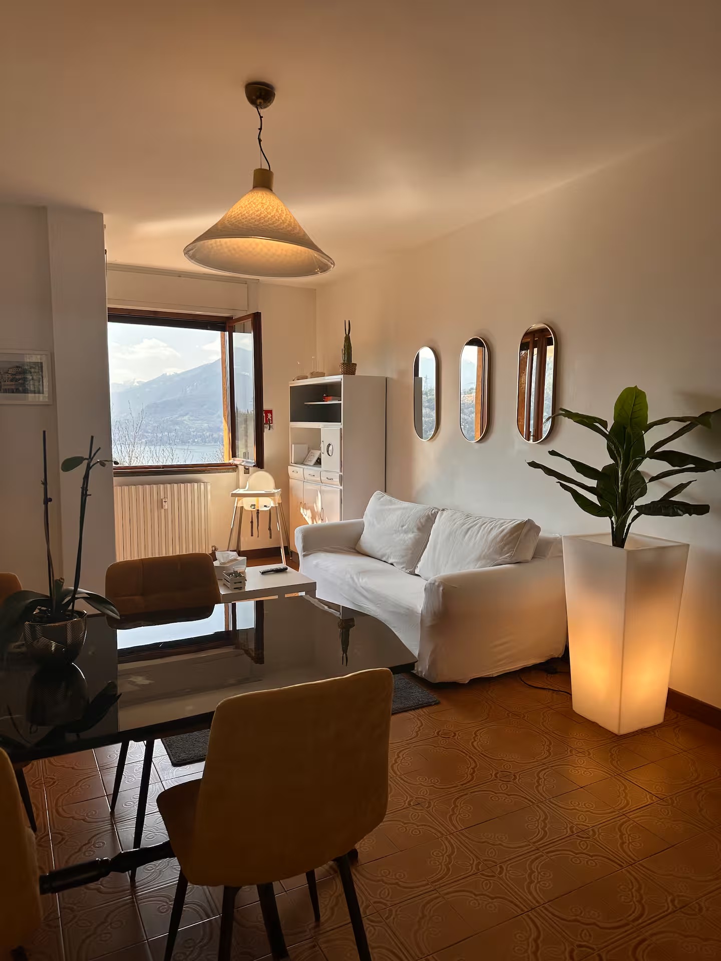 Living room with sofa and dining area